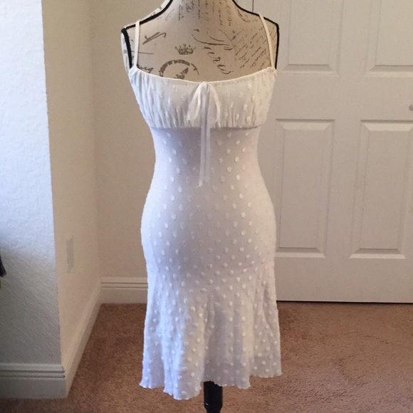 bebe Dresses & Skirts - Bebe moda white polka dot dress. Bow midi